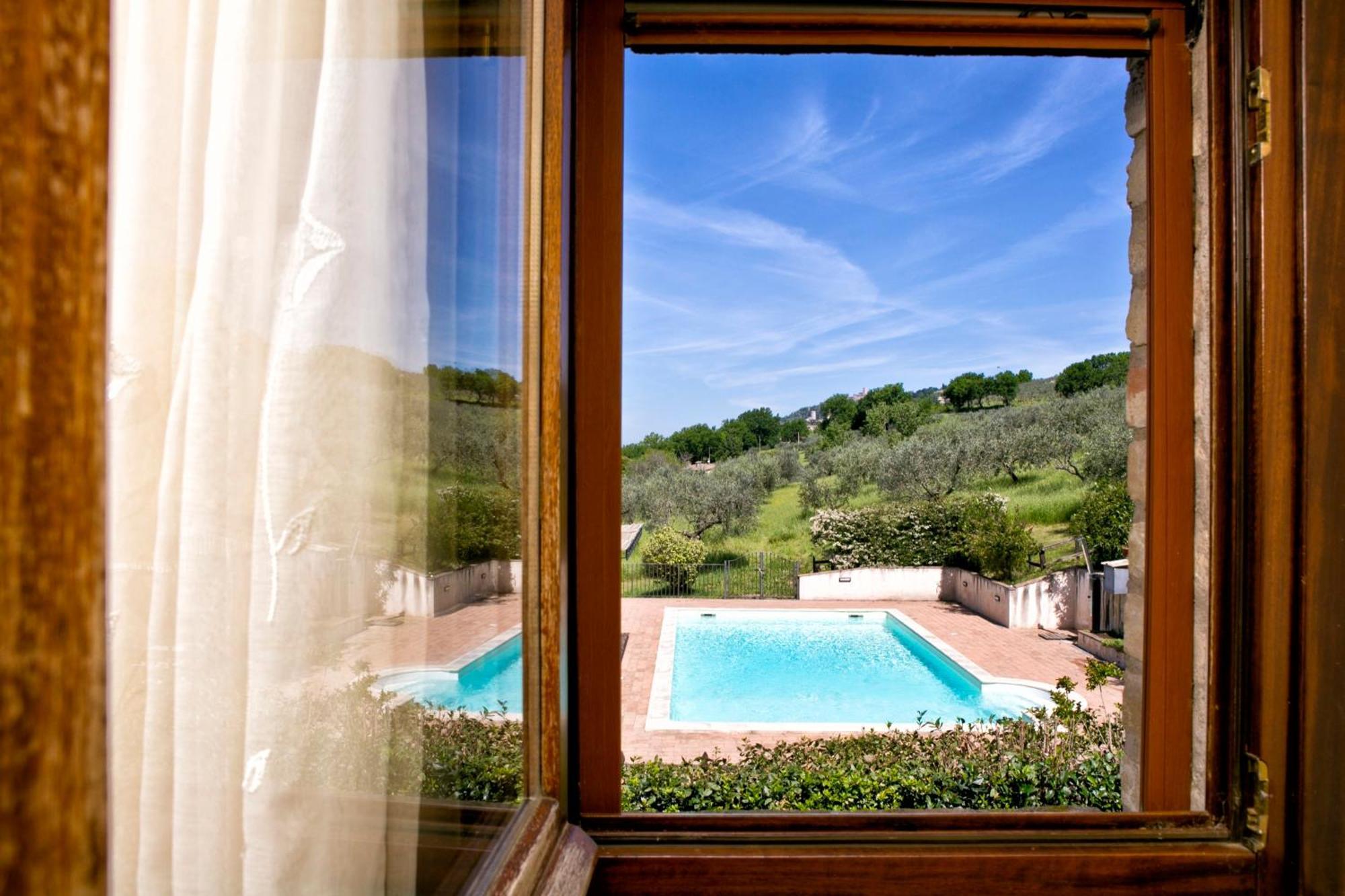 Villa Rosy Assis Exterior foto